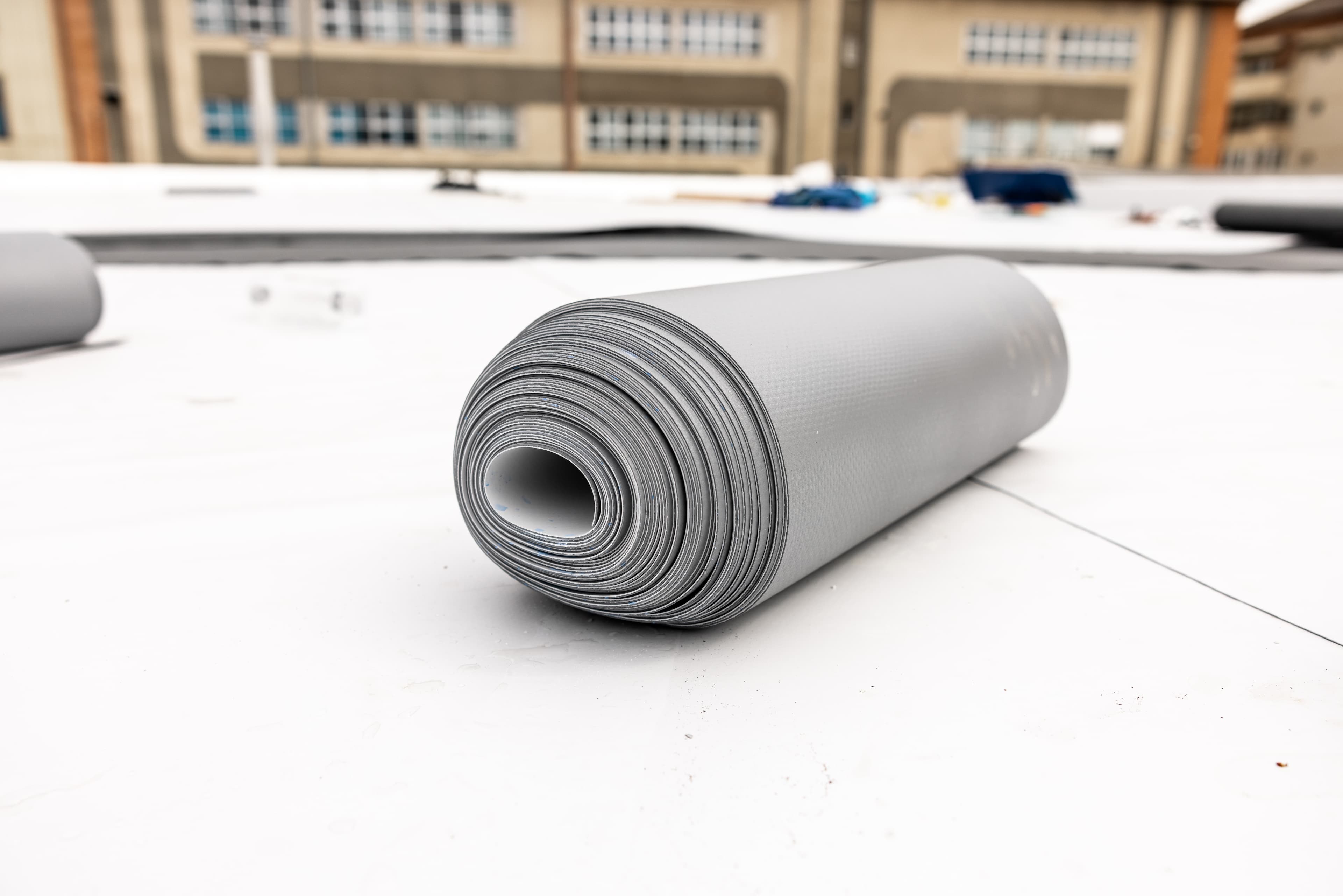 Commercial flat roof installation on a St. Louis-area building.